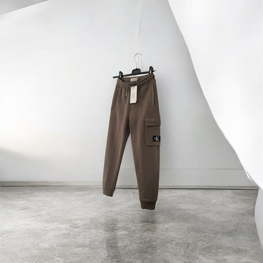 Calvin Klein Jeans BADGE RELAXED PANTS - Pantaloni sportivi - beige